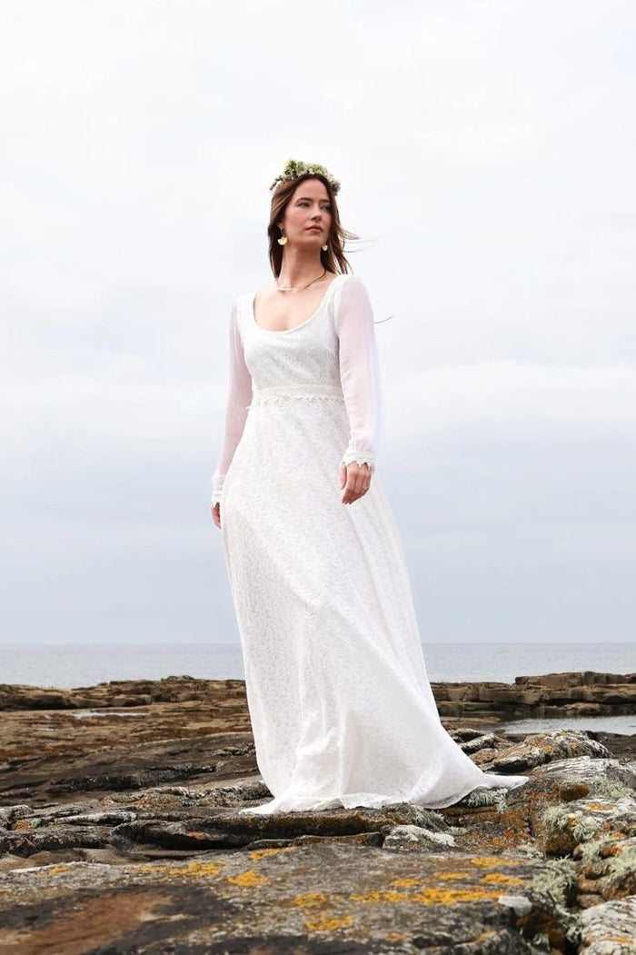 Celtic wedding dress in ivory cotton lace with bishop sleeves and soft flowing skirt for a handfasting ceremony