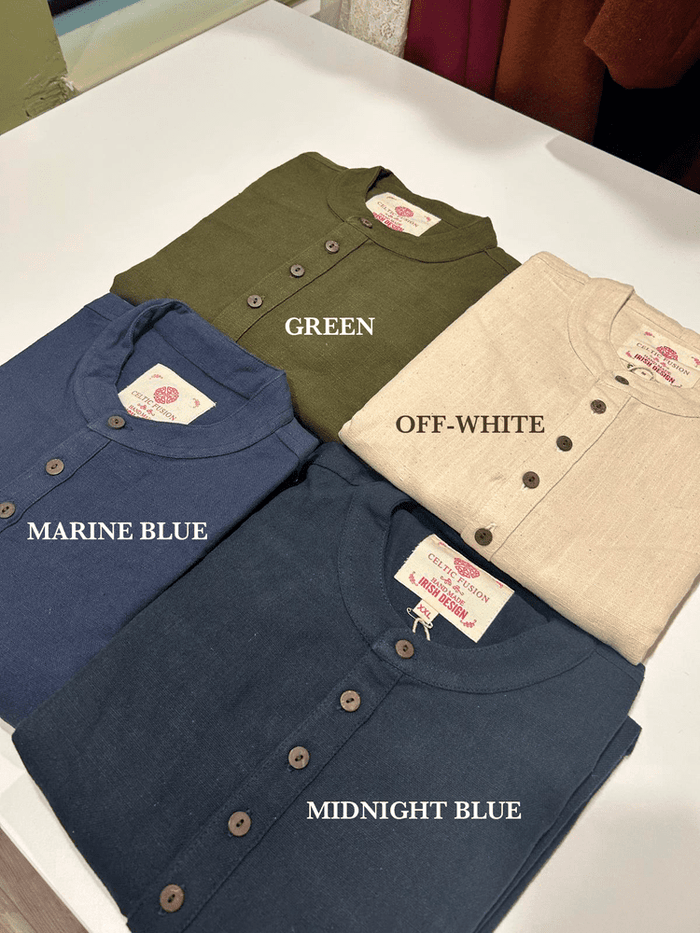 Men’s folk style shirt in four colour options with folded presentation and button detail