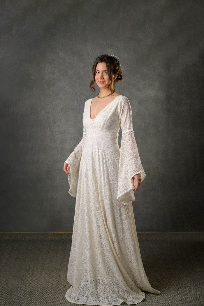 Celtic Fusion wedding dress with sleevs in Ivory cotton lace, deep neckline and dramatic bell sleeves, the perfect natural bridal gown