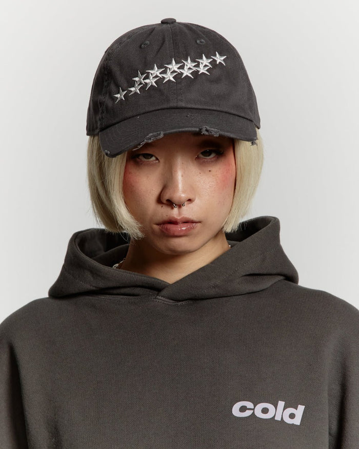 STARS CAP DARK GREY - dark grey distressed cap, on model close-up - Cold Culture #woman