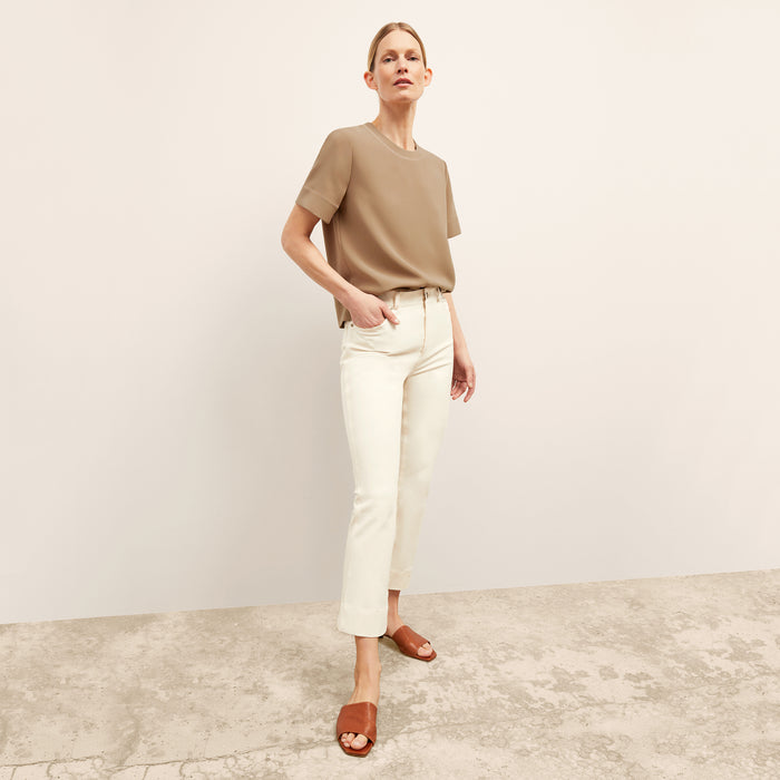 Front image of a woman wearing the Archie Jean in Tusk