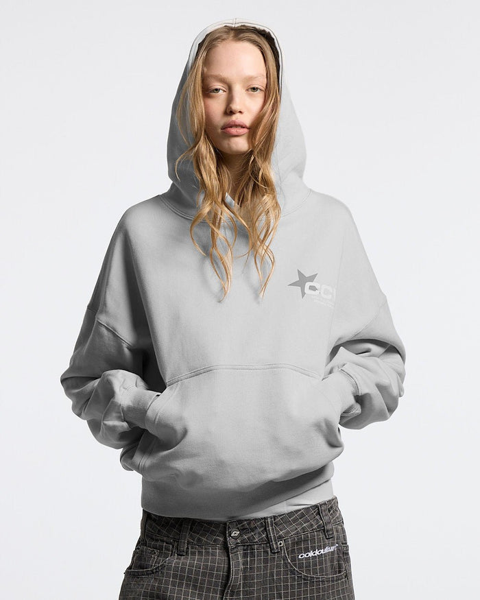 ASTRO HOODIE - light grey star print hoodie, front view on female model - Cold Culture #woman