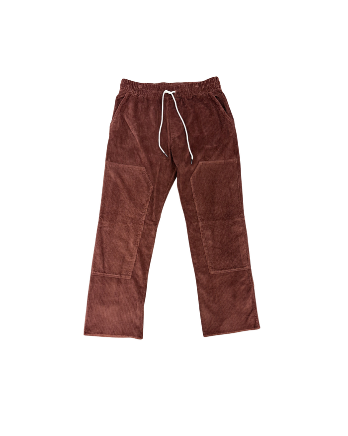 Brown corduroy pants with a drawstring on a white background