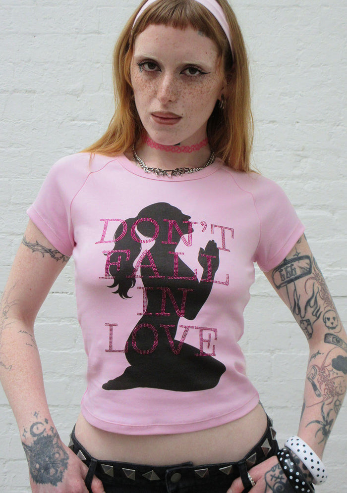 DON'T FALL IN LOVE RHINESTONE BABY TEE BABY PINK