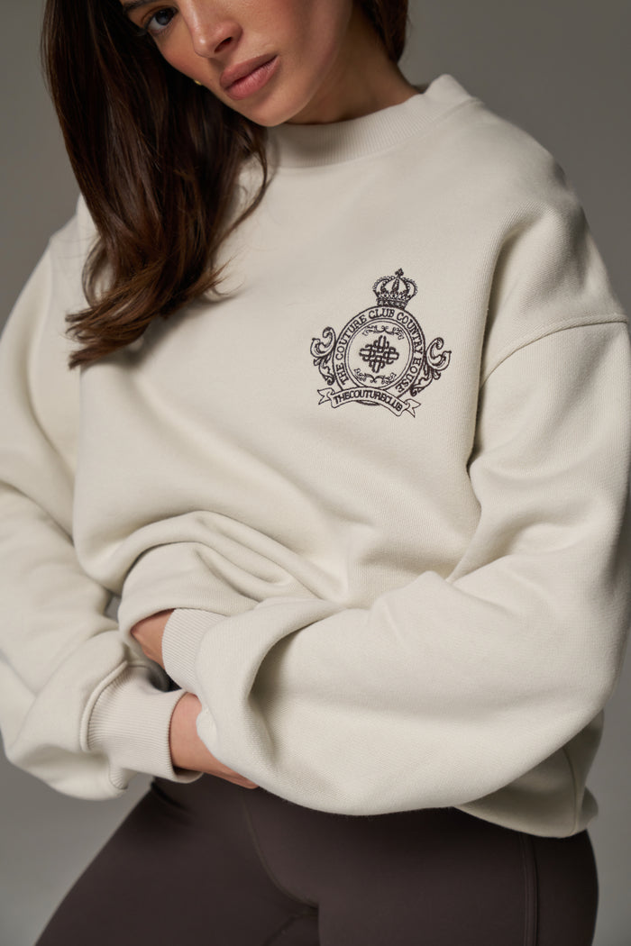 EMBROIDERED CREST OVERSIZED SWEATSHIRT - BONE