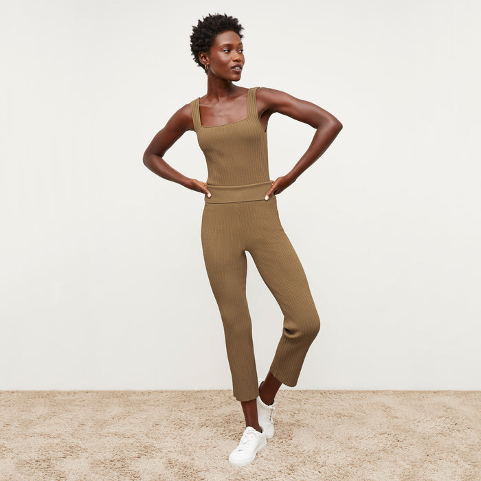 Front image of a woman standing wearing the Finley Legging—Ribbed Jardigan Knit in Light Bronze | Lead