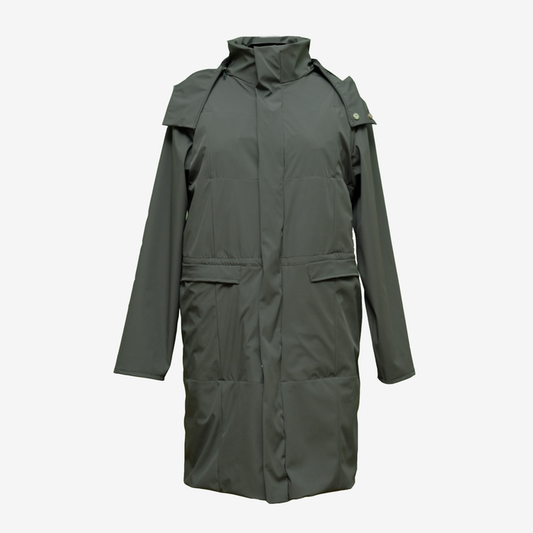 FlyOn travel jacket worn at airport carrying clothes without luggage