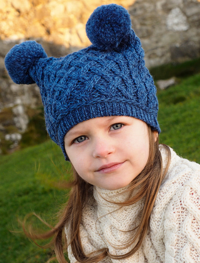 Kids Merino Aran Trellis Pom Pom Hat - #color_blue-marl
