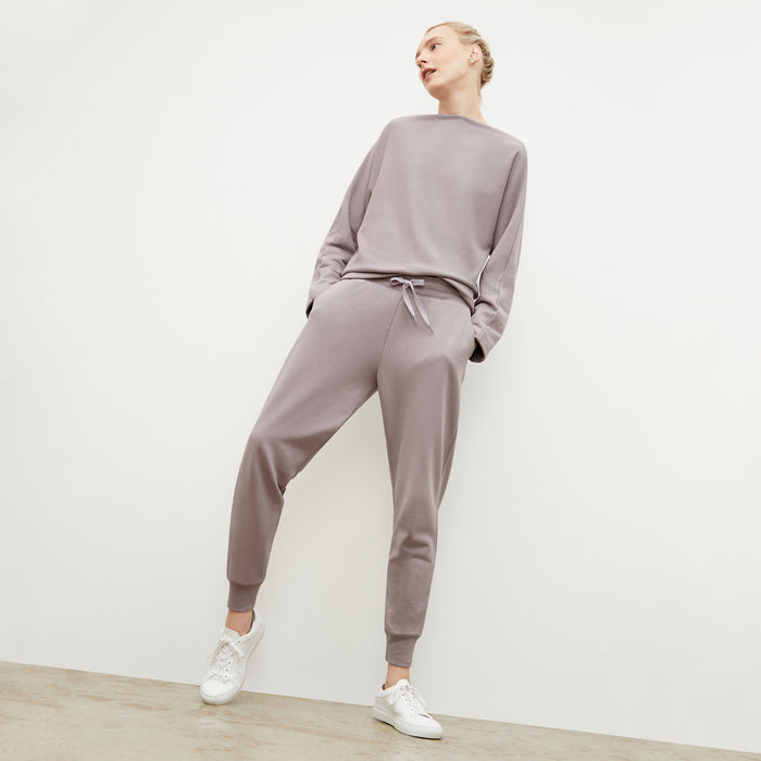 Front image of a woman wearing the Kristin Pullover - French Terry in Wisteria