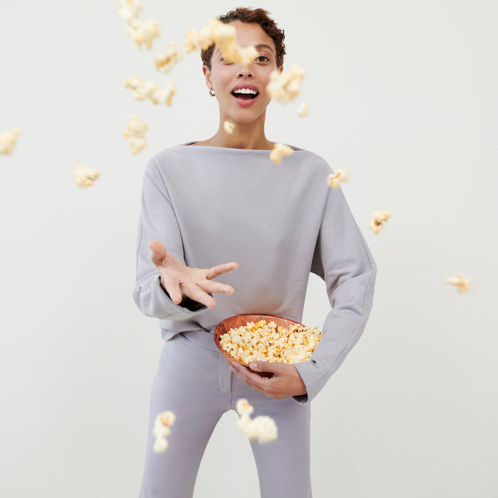 Front image of a woman wearing the Kristin Pullover - French Terry in Wisteria