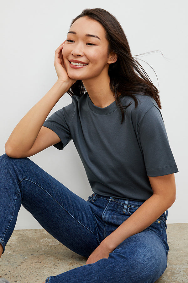 Front image of a woman wearing the Leslie T-Shirt - Pima Cotton in Dusty Indigo | Grid | Exclude