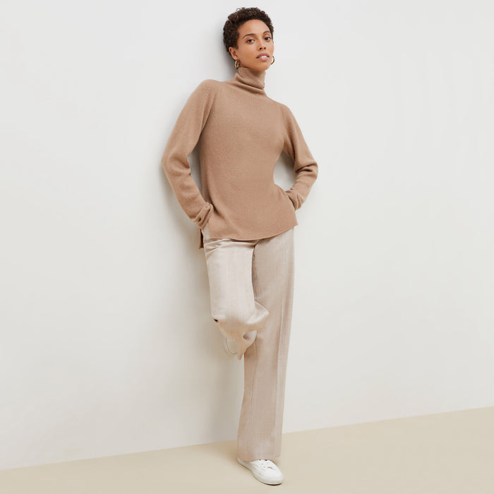front image of a woman wearing the mckenzie sweater in deep flax | Lead