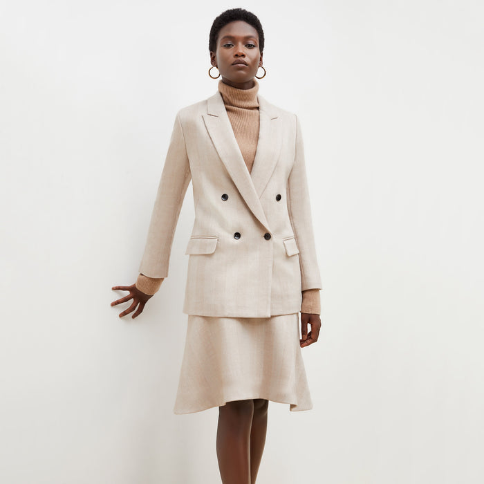 front image of a woman wearing the mckenzie sweater in deep flax | Exclude