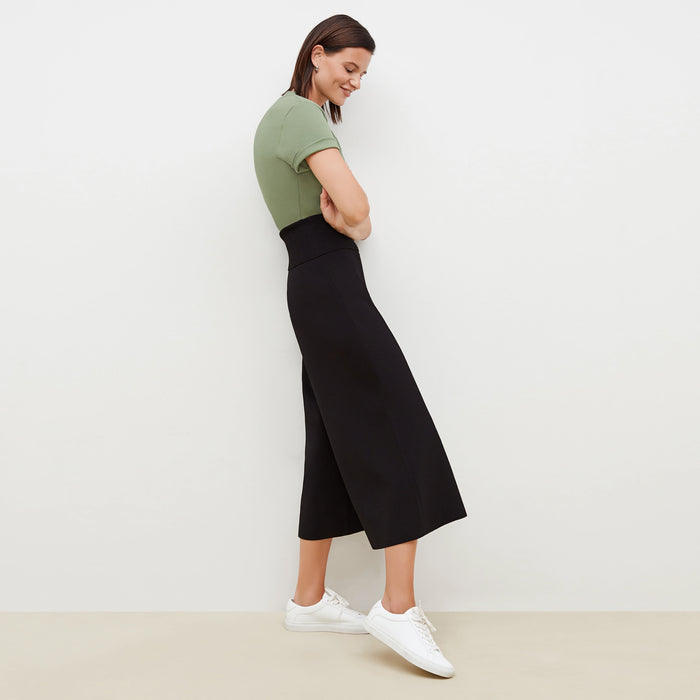 Side image of a woman standing wearing the Rogala Pant—Jardigan Knit in Black