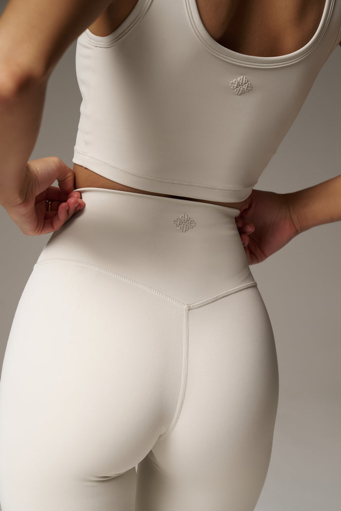 SCULPTING STRETCH EMBLEM LEGGINGS - BONE