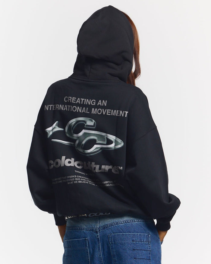 SPARKLY HOODIE BLACK - black graphic print hoodie, back view on female model - Cold Culture #woman
