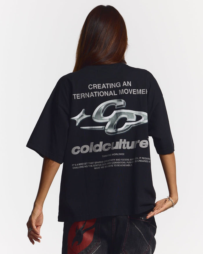 SPARKLY TEE BLACK - black graphic print tee, back view on female model - Cold Culture #woman
