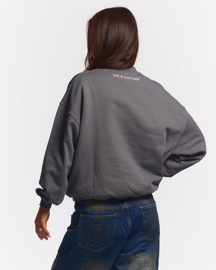 STARS CREWNECK DUST GREY - grey star print crewneck sweatshirt, back view on female model - Cold Culture #woman