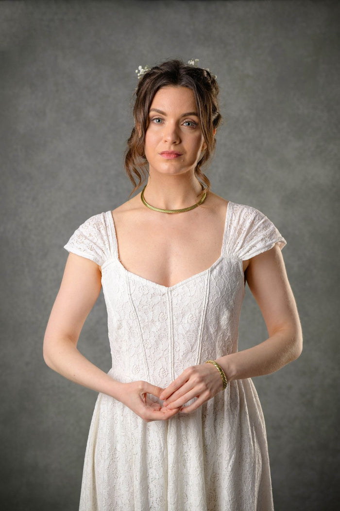 Corset wedding dress bodice in ivory floral cotton lace with gathered cap sleeves and soft sweetheart neckline