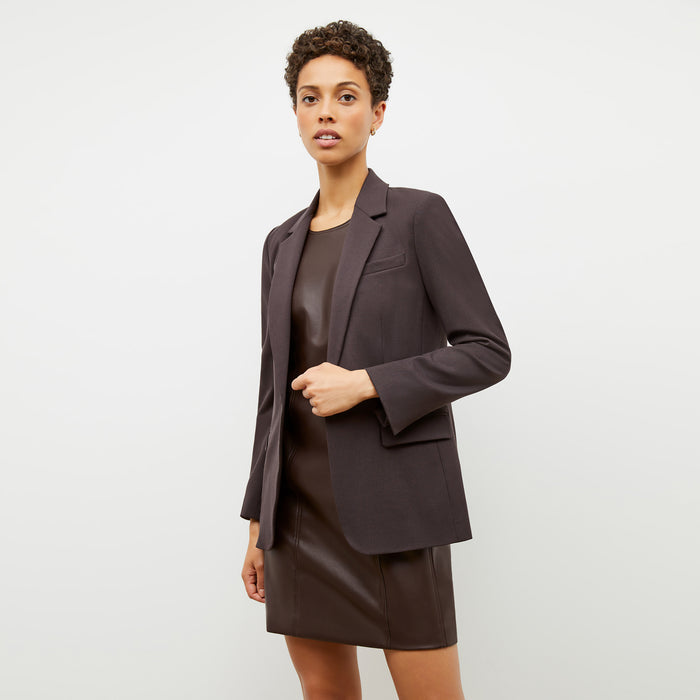 Detail image of a woman standing wearing the Yiyan Blazer in Haze | Lead