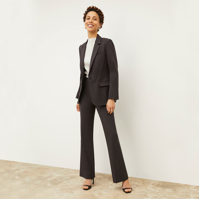 Front image of a woman standing wearing the Yiyan Blazer in Haze | Exclude