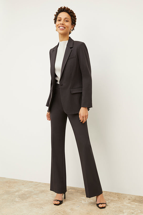 Front image of a woman standing wearing the Yiyan Blazer in Haze | Exclude | Grid Hover